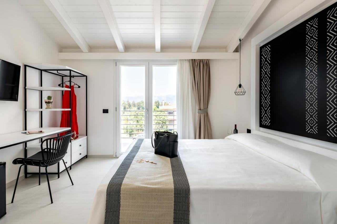 Cara A Bentu - Charming Rooms 托尔托利 外观 照片